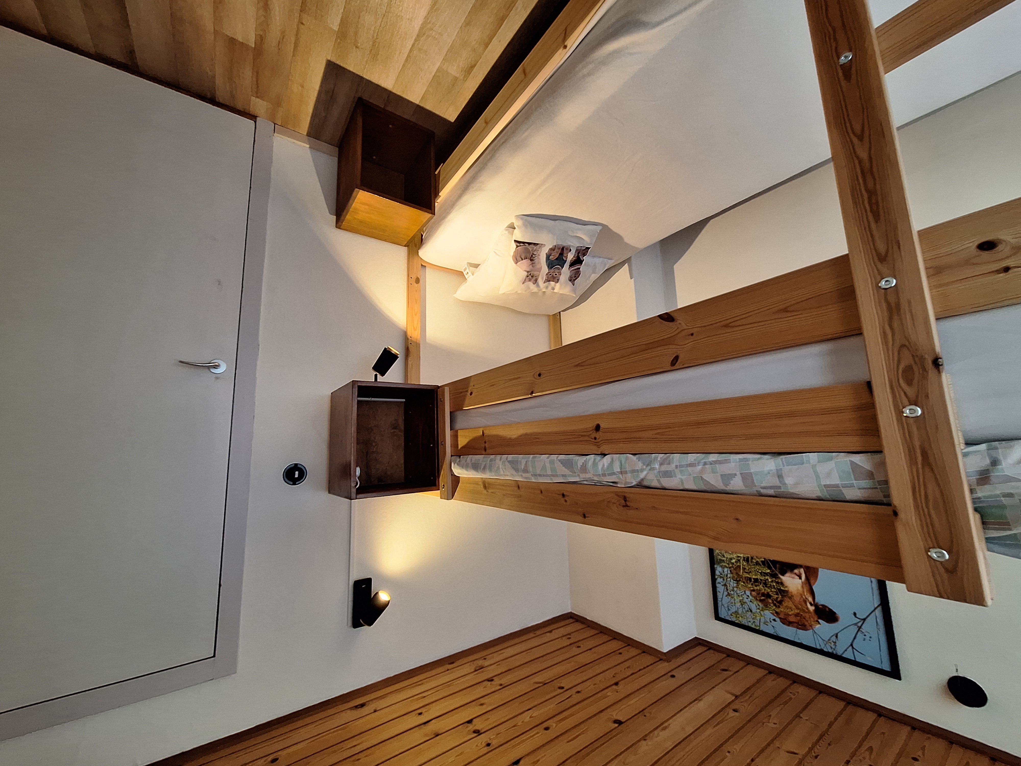 Slaapkamer achter met stapelbed